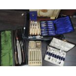 A selection of cased plated flatware, a cased 3 piece antler handled carving set etc