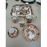 A selection of Royal Crown Derby ware in the gilt heightened Imari pattern