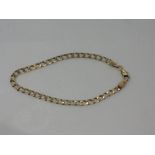 A 9ct gold flat curb link bracelet