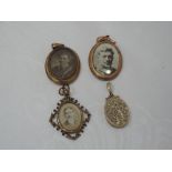 Three rolled gold glass lockets and an oval rolled gold locket having engraved decoration