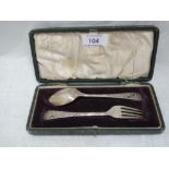 A cased Victorian child's silver spoon and fork set, Sheffield 1898, James Deakin & sons