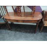 An early 19th century George III mahogany D end side table on tapered legs