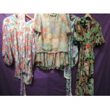 A lot of four 1980s silk Diane Freis outfits, all good condition, in various vibrant patterns.