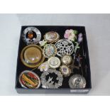 A small selection of costume jewellery brooches, including ceramic and wooden, a pendant watch and a