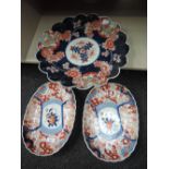 A pair of early 20th century Victorian dishes of Imari design, and a similar scallop charger