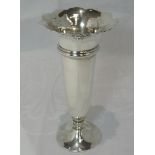 A silver trumpet style bud vase having weighted base and moulded decoration to rim, Birmingham 1922,