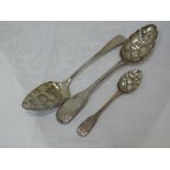 Three Georgian silver berry spoons having bright cut decoration and shaped bowls, London 1802/17/28,