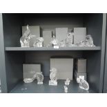 A selection of fine clear cut Waterford crystal figures including sea lion, pig, cat and elephant