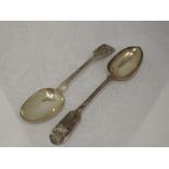 A pair of silver table spoons of fiddle back form, monogrammed Holt to terminals, Exeter 1851,