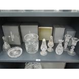 A selection of fine clear cut Waterford crystal wares including biscuit barrel, candle sticks etc