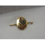 A yellow metal bar brooch bearing enamelled panel depicting a cockerel and motto 'celar atque