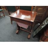 A mid 19th century mahogany serving table having rectangular top with pull drawer on square sides