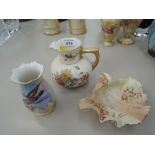 A Royal Worcester jug having gilt heightened floral decoration, and a Royal Worcester shell dish and