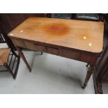 A 19th century mahogany tea table having frieze drawer, on turned gate legs