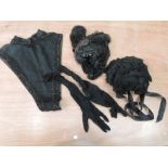 Two Victorian black bonnets, a beaded bodice panel and a pair of sheer gloves.one bonnet having lace