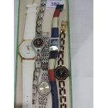 Five lady's assorted fashion watches including Tommy Hilfiger and Radley
