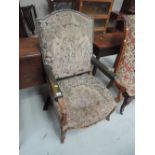 An early 20th century stained beech chair in the 19th century French style having tapestry
