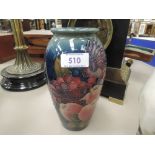 A modern Moorcroft vase of urn shape in Finch & Fruit Berry pattern on blue/green ground impressed