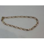 A 9ct gold figaro link bracelet