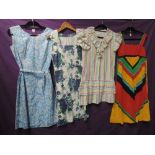 Four vintage cotton dresses/pinafores,lovely bright patterns. good condition, mainly 1960s.