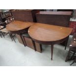 A pair of 19th century George III style mahogany D ends to form dining table, on tapered legs and