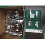 A selection of loose plated flatware including Kings pattern teaspoons and forks, lobster picks,