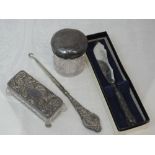 Four pieces of HM silver including two cut glass dressing table pots, a silver handled butter