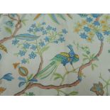 A large piece of medium weight vintage cotton fabric in blues and greens with birds and pineapples.