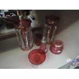 A selection of cranberry glass including pair of Victorian lustres etc