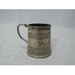 A Georgian silver miniature tankard having reeded decoration to body, monogram to front and