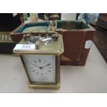 A 19th century brass traditional design French carriage dial clock, engraved Aigulles, with case
