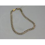 A 9ct gold flat link curb chain bracelet