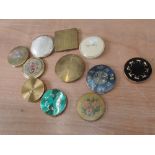 An assortment of pretty vintage compacts, including Stratton , Yardley and Max Factor. Good
