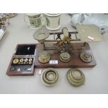 A set of vintage postal scales, brass weight and jewellery scale weights