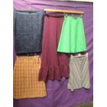A lot of five vintage 1960s and 70s skirts, one in Welsh wool the others a mixture of styles and