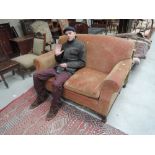 An early 20th century mahogany frame settee with later upholstery by Odd, Chair Company, Lancashire,