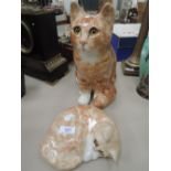 Two pottery ginger tom cats by Winstanley, signed