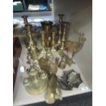 A selection of brassware including candlesticks, trench art etc