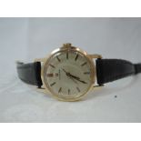 A lady's 9ct gold Omega wrist watch no: 23442016 having a baton numeral dial to circular face on a
