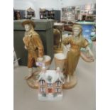A pair of Worcester figures modelled as grape harvesters by James Hadley, signed , and a 19th