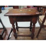 A 19th century oak joint stool in the Jacobean style having rectangular top on baluster legs