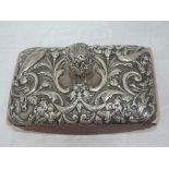 A Victorian silver mounted rocking blotter having moulded bird, scroll and mask decoration and