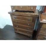 A late 20th century mahogany period style dressing chest having fold out brush top on inlay