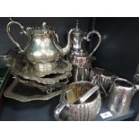 A selection of silver plate including table baskets, tea pot, coffee pot, sugar and cream jugs etc