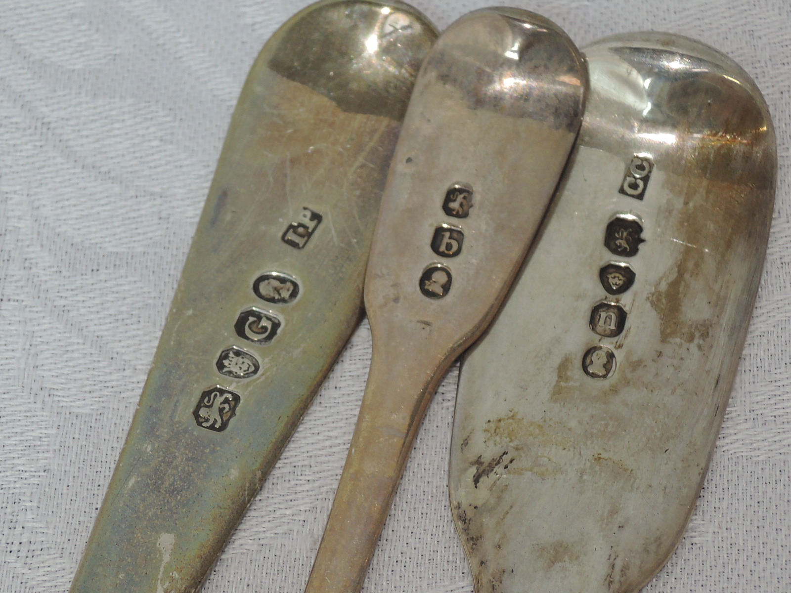 Three Georgian silver berry spoons having bright cut decoration and shaped bowls, London 1802/17/28, - Image 2 of 2