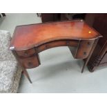 A late Victorian mahogany ladies writing desk having line inlay decoration and central bow recess,