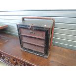 A vintage Oriental travel cabinet having handle and fall front