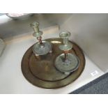 A pair of 19th century brass and hardstone candlesticks of Middle Eastern design and a brass