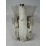 An Irish Art Nouveau silver vase of fluted square form having four moulded shaped side handles,