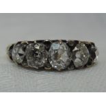 A lady's dress ring having five graduated old cut diamonds, total approx 1.5ct having diamond